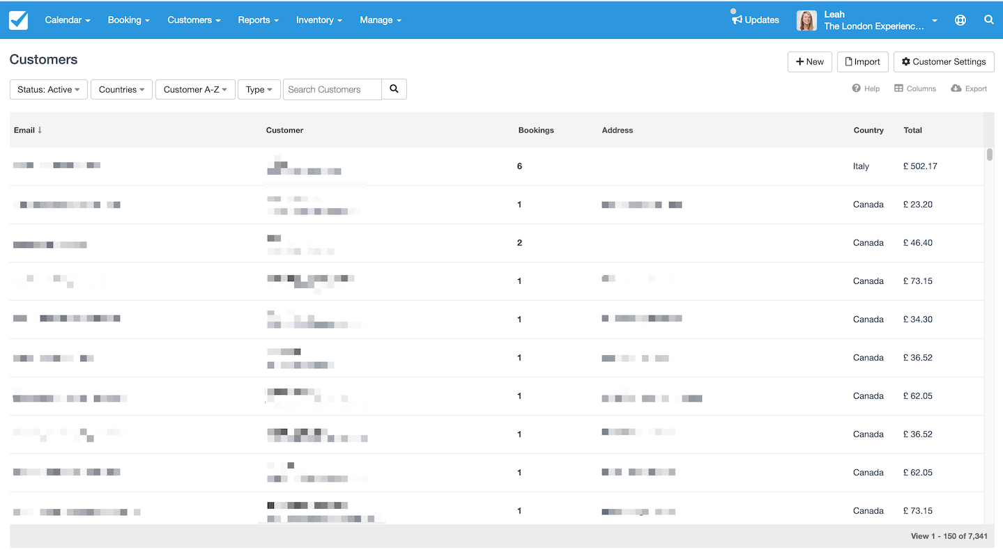 Customers page displaying a list of customer emails, names, booking counts, addresses, countries, and totals with filter options at the top.