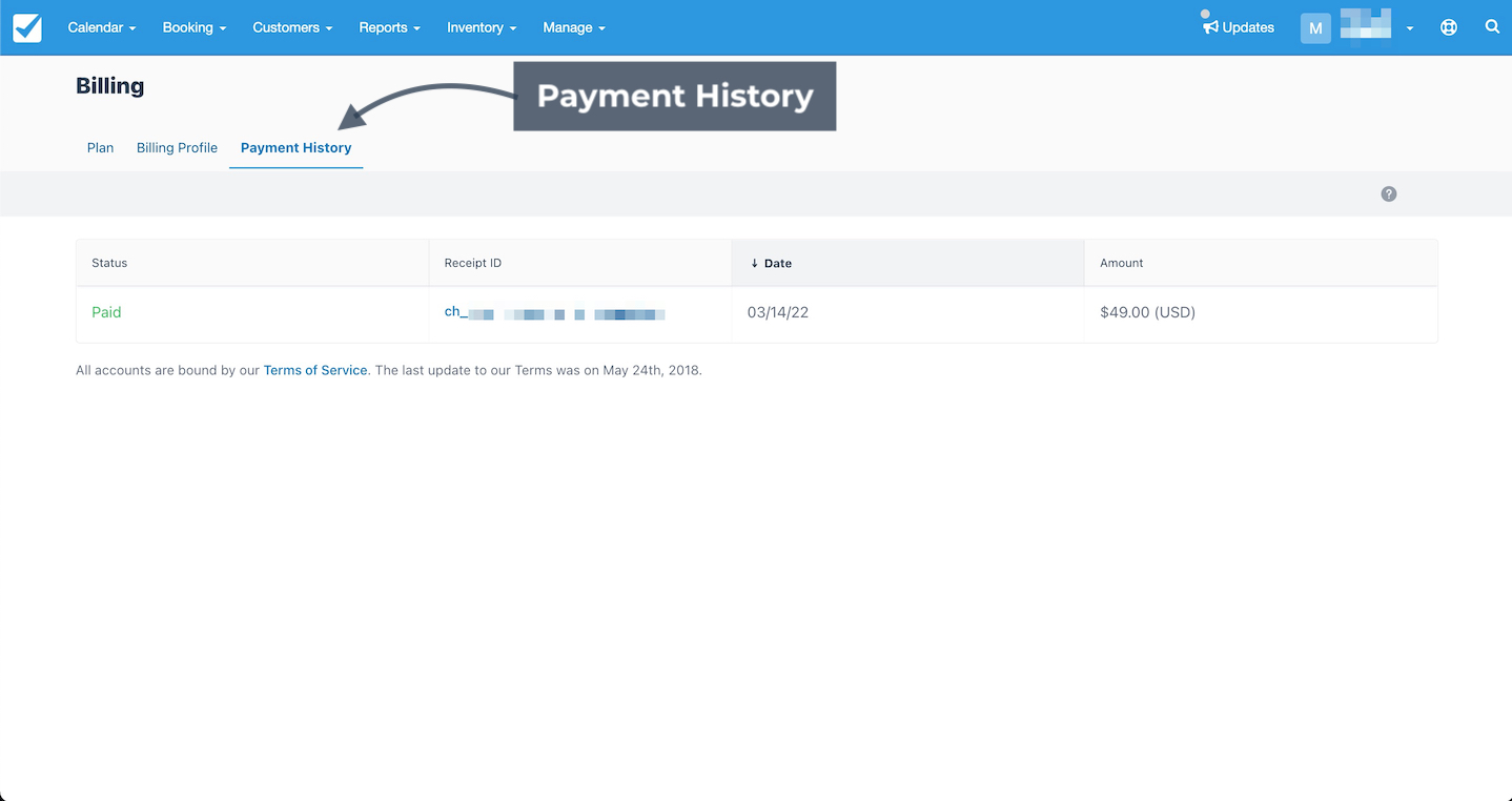 Billing section displaying the Payment History tab with an arrow highlighting the record of a paid invoice.