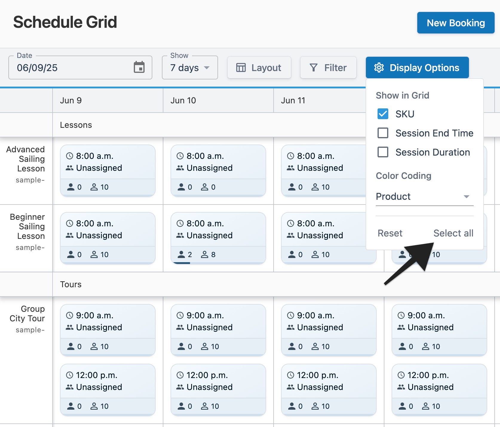 Schedule grid page with an arrow pointing to the ‘Select All’ option in the open ‘Display Options’ menu to indicate selection.