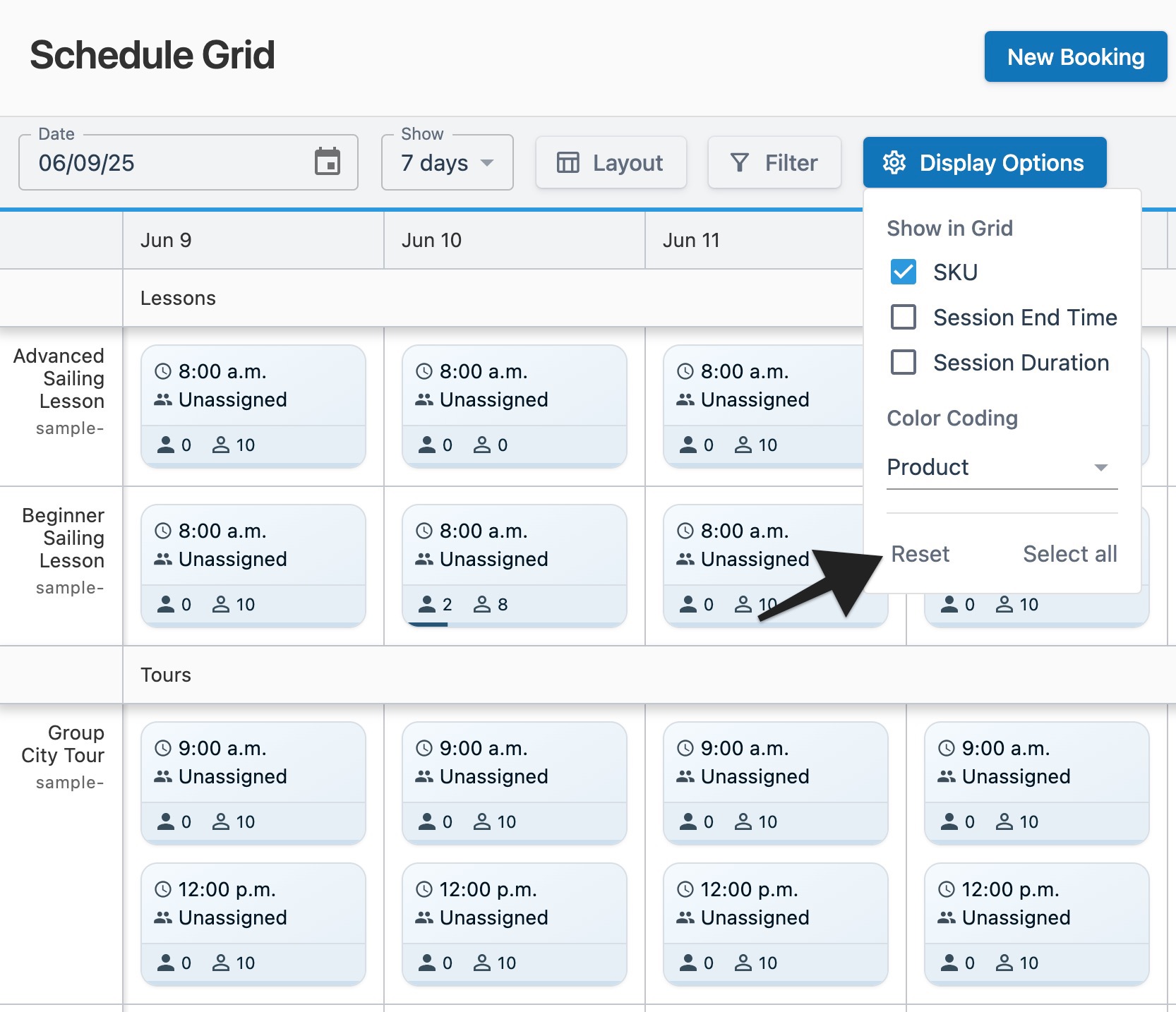 Schedule grid page with an arrow pointing to the ‘Reset’ option in the open ‘Display Options’ menu to indicate selection.