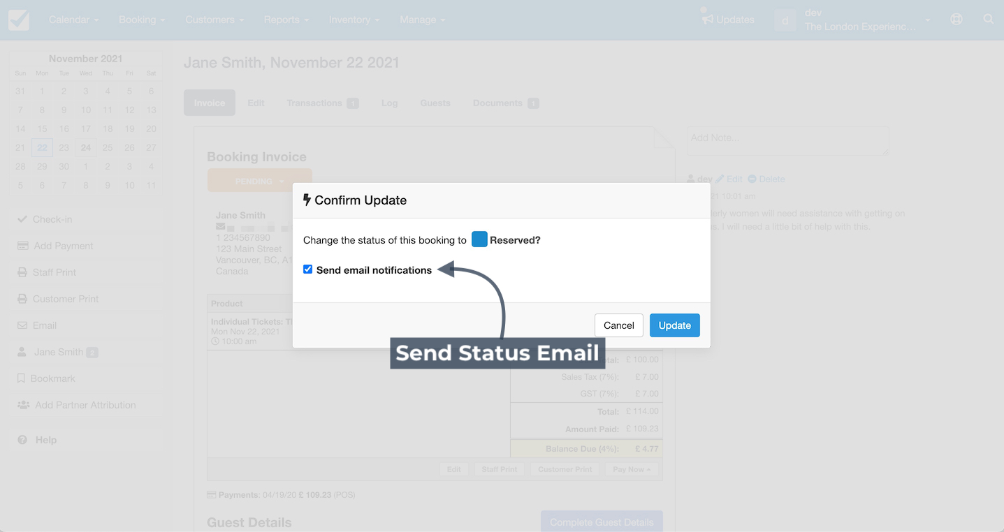 Booking system confirmation window showing the option to send an email notification when updating the reservation status.