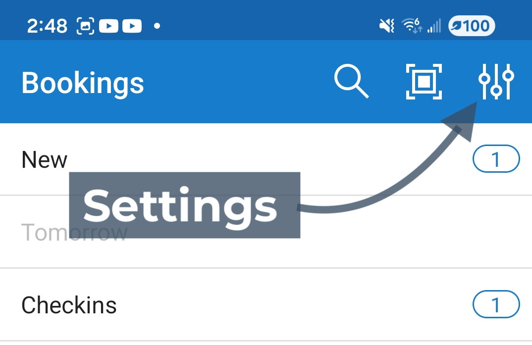 Android home page with annotation pointing to the settings icon.