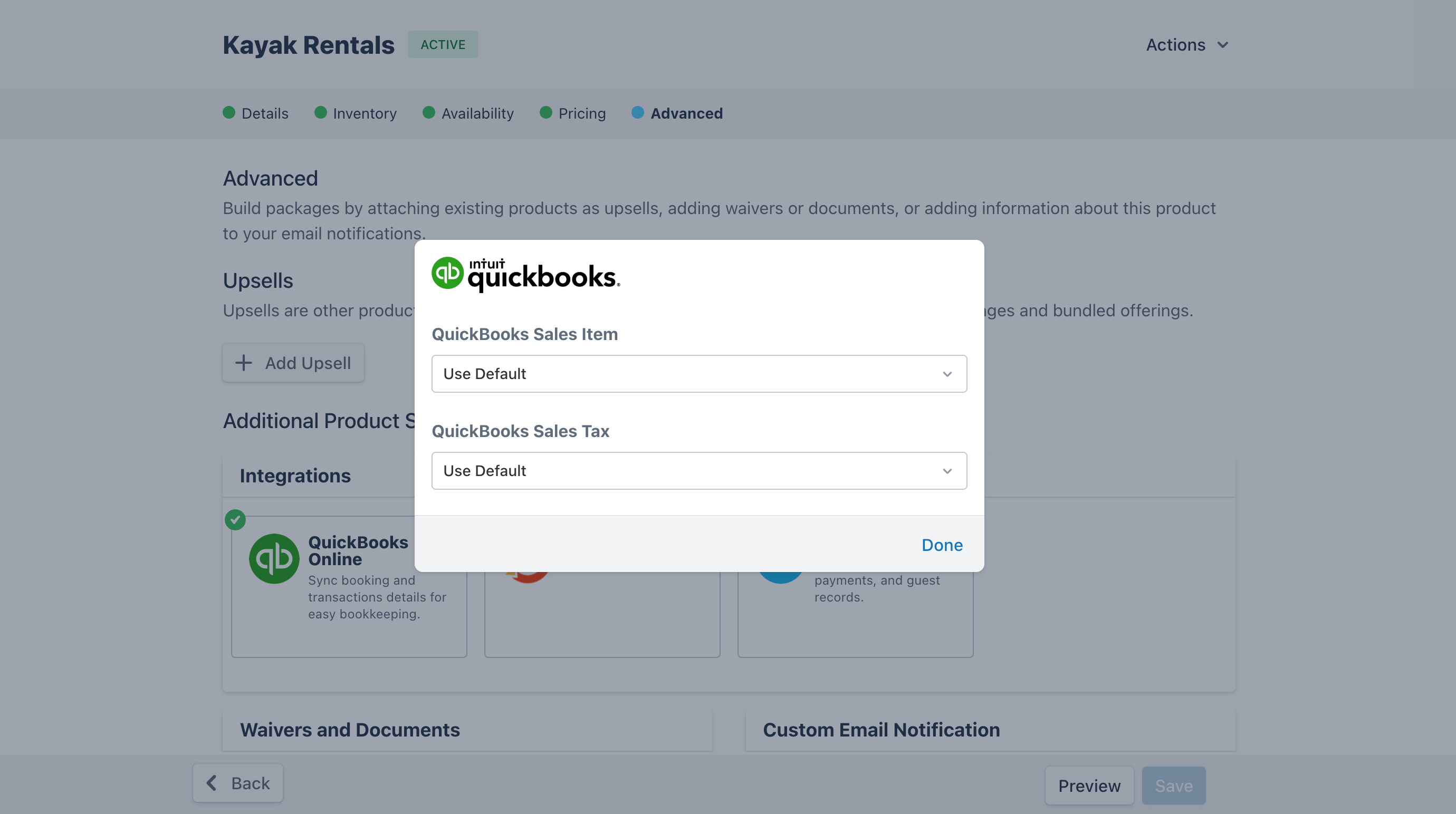 Advanced tab of Product Builder with QuickBooks modal open showing override settings.